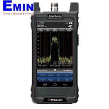 Technician using a cable and antenna analyzer in an RF testing environment