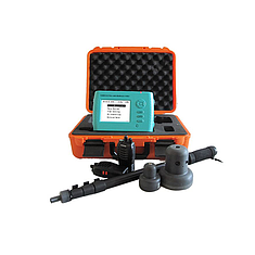 Technician performing calibration work for a concrete floor slab thickness measuring instrument