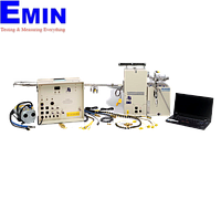 Technician servicing emissions gas sampling equipment for industrial gas measurement