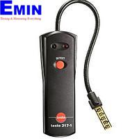 Technician servicing a combustion and emission gas analyzer used for flue gas measurement